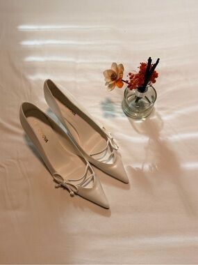 Fashion Nova Cream Pointed-Toe Ballet Flats with Bow Detail
